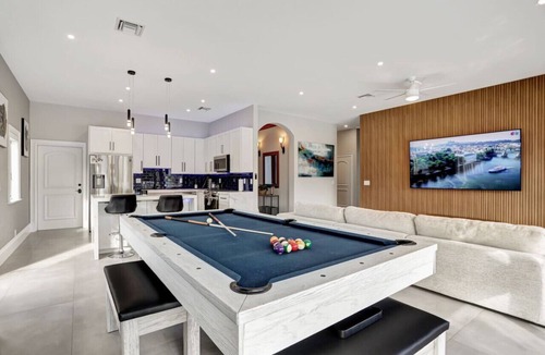 South New River Isles House | 3BR Waterfront Villa with Heated Pool, Spa, & Rooftop Deck