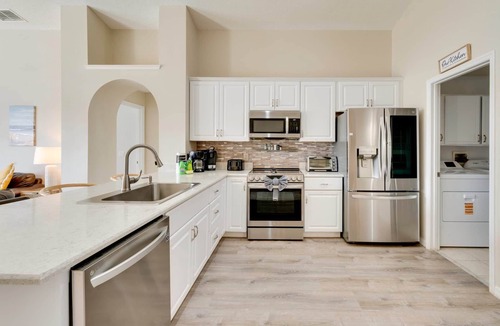 Historic Downtown Kissimmee House | 4 BR Private Pool and Lake View Near Disney