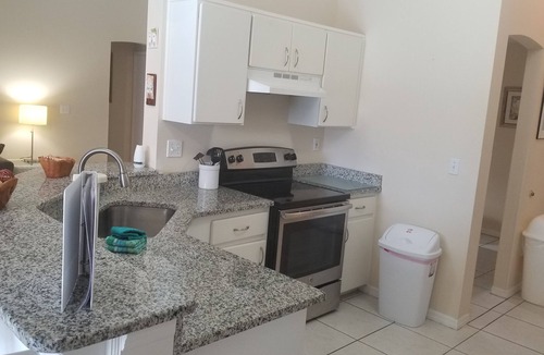 Indian Ridge House | 4br king master pool wifi minutes to disney, granite counters, tiled flooring