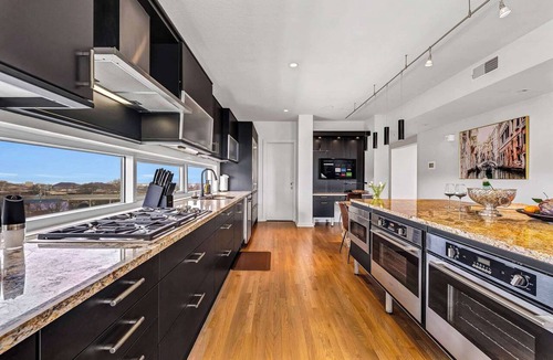 Ohio City Condo | 4BR Penthouse + Patio & Gym + Private Parking