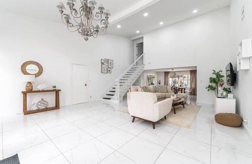 Lighthouse Point House | 4BR Tiki Villa, Pool, Spa, Dock & Private Waterfront