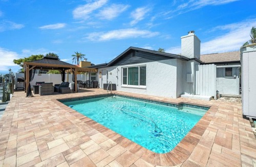 Hudson Beach Estates House | 4BR Waterfront | Boat Dock + Pool | 11-Min Walk to Beach | Sleeps 8
