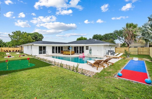 Villages of Palm Beach Lakes House | 6BR Beach Resort-Style Game House! Heated Pool