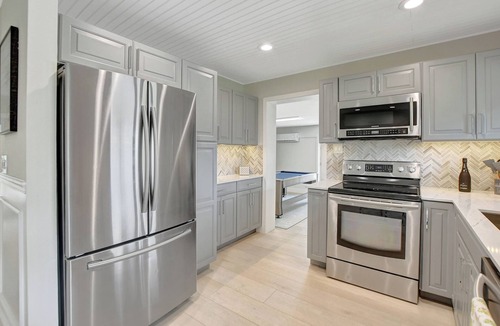 Boynton Beach House | 702B Lux Chapel Hill Beach Retreat: Heated Pool, Putting Green & Ping Pong Fun!