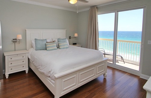 Panama City Beach Condo | 8th Floor! GORGEOUS CONDO! Wrap balcony with loungers. Master with Beach View