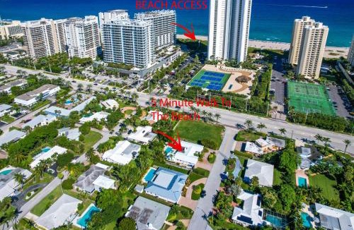 Singer Island House | Across from Beach- 3 Master Suites, Heated Pool & Spa, Tanning Ledge, Golden Tee - by Maven Vacation Rentals