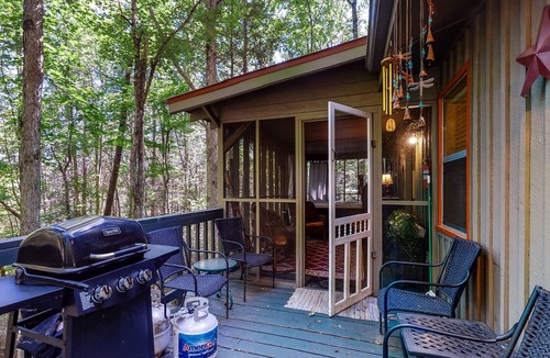 Cashes Valley Cabin | Adorable cabin w/ a private hot tub, screened porch, firepit, & forest views