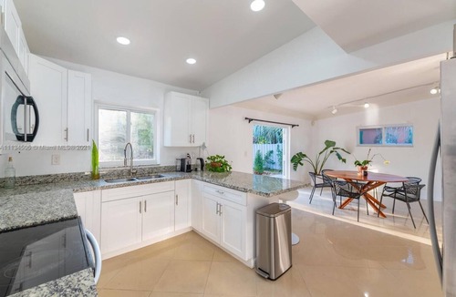 Central Fort Lauderdale House | Amazing backyard for Family vacation with heated pool.