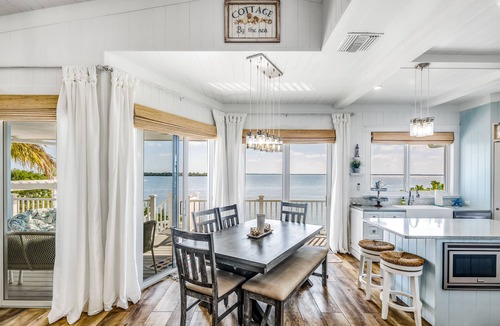 Cutthroat Harbor Estates House | Amazing waterfront home with private beach, dock, pool, WiFi & outdoor kitchen