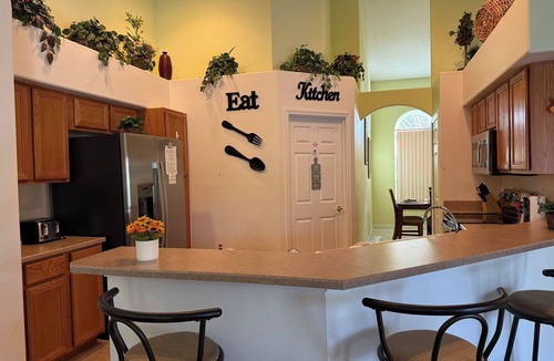 Orange Tree House | Antigua Lake View Villa with Peaceful Pool & Waterfall. Near Disney Free WiFi.