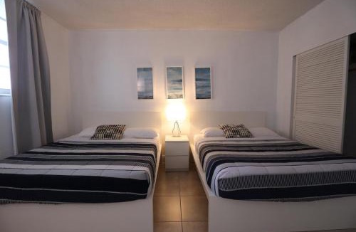 Hollywood South Central Beach House | Apt w/2 Queen Beds & Canal View at Tides