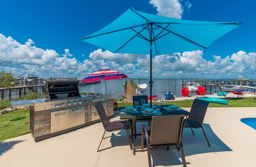 Stuart House | Aquatopia South: Riverfront Beach House, Steps 2 Ocean. Heated Pool & Dock!