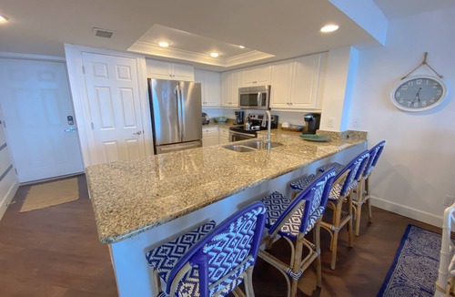 Punta Rassa Apartment | Bay View Tower 334: Enjoy fishing by day, and Beachfront views for Sunset