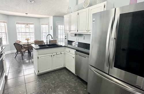 Navarre House | "Bayou Breeze" Private Pool (Heated) Gorgeous Home! Bikes, Game room