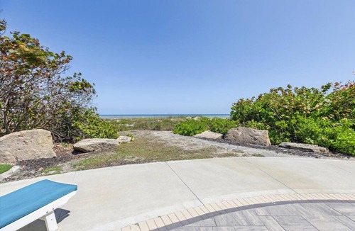 Cocoa Beach House | Beach Front Home with Gated entry Large sparkling pool and private beach access