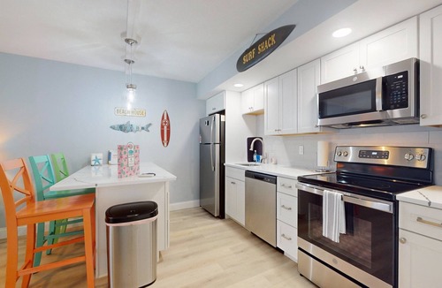 New Smyrna Beach Condo | Beach Hideaway NSB- Steps to the beach