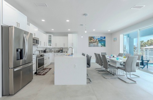 Mid Island House | 🏖️ 🏊 Beach Please: 6BR Luxury Retreat, Heated Saltwater Pool + Beach Access!