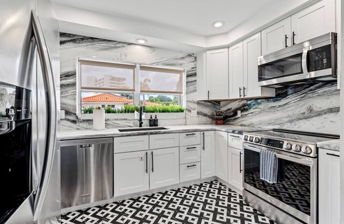 Lauderdale Beach House | Beach Pop - Steps to Beach, Heated Pool & Hot Tub