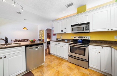 Cocoa Beach Cottage | Beach & Resort Access - Pet Friendly w/Fire Pit