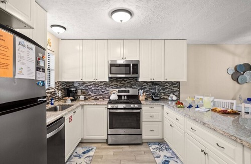 Panama City Beach Villa | Beach Royale - Pool View, Golf Cart, 11 Pools