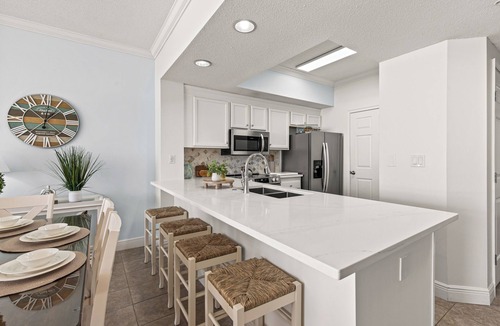Fort Walton Beach Condo | Beachfront 3/2 condo with free beach service of 2 sets - park steps to the door.