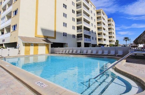 Redington Shores Condo | Beachfront corner condo w private balcony heated pool hot tub picnic tables