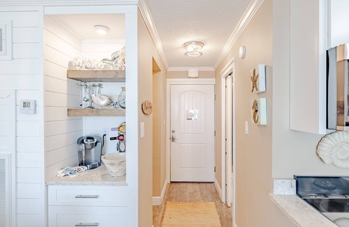 Panama City Beach Condo | Beachfront Ground Floor Studio Condo with Patio Seasonal Beach Service Included