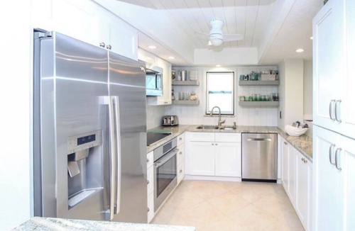 Hutchinson Island South Villa | Beachfront on the ocean, gated beach entry, walk to restaurants, boutique decor