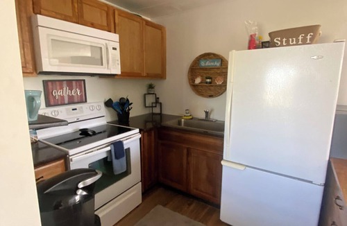 Truth or Consequences Cabin | Beautiful 2-bedroom cozy getaway beachside with outdoor patio and lake toys
