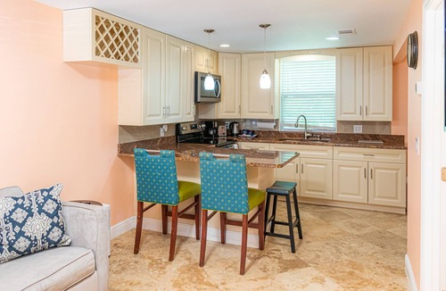 Indian Shores Condo | Beautiful condo across the street from the beach. Pet/kids friendly