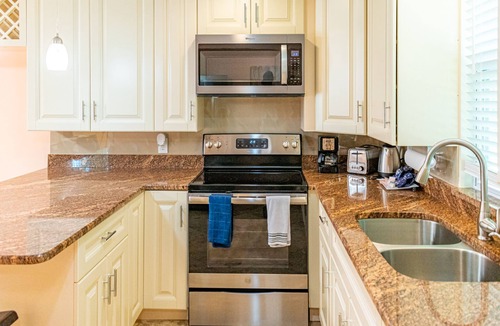 Indian Shores Condo | Beautiful condo across the street from the beach. Pet/kids friendly