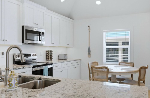 Palm Island House | Beautiful GROUND LEVEL Pool home, totally renovated .PET FRIENDLY!