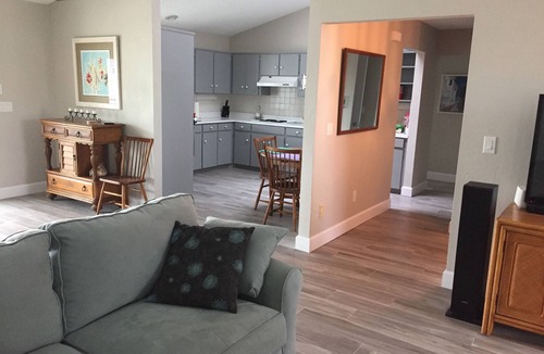 Ormond Beach House | Beautiful home steps to the beach with year round heated pool and spacious lanai