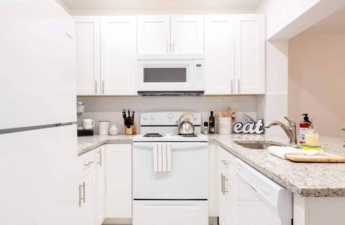 Santa Barbara Estates Condo | Beautiful Waterfront Condo on Canal with Pool & Walk to Beach! Boat Watch! 2b/2b
