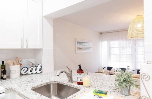 Santa Barbara Estates Condo | Beautiful Waterfront Condo on Canal with Pool & Walk to Beach! Boat Watch! 2b/2b