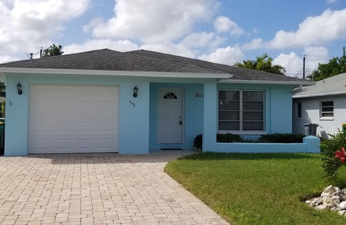 Naples Park House | Beautifully Decorated Beach Cottage with Sparkling Heated Pool