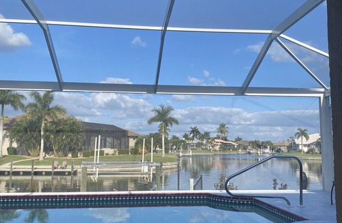 Burnt Store Isles House | Beautifully remodeled three bedroom two bath waterfront property with pool.