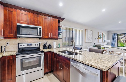 Hunt Club Cottage | Beautifully updated, end unit, waterfront club cottage. 2BR 2BA + Pool and More!