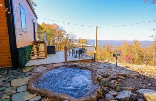 Wildwood House | Blooming Redbud Treehouse with private hot tub