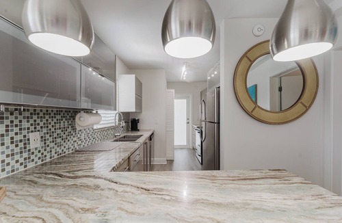 Boca Raton Apartment | Boca Waterfront Oasis: Bright Corner Unit – Walk to Beach