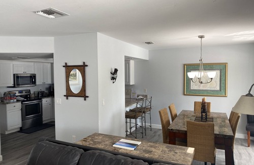 Mid Island House | Book now for spring break specials. Over 25 restaurants and bars open.
