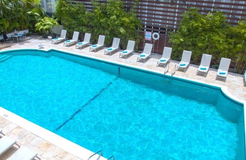 City Center Hotel | Breathtaking Getaway w/Kitchenette, Pool, Walk to Ocean & Local Vibes