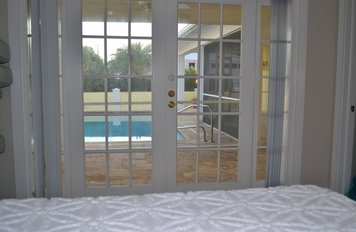 Juno Beach House | Bright, airy private home with pool steps to beach