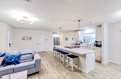 Dunedin House | Bright and open home with private pool screened lanai enclosed yard and WD