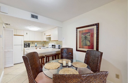 Cape Caneveral Beach Gardens Condo | Bright corner condo with shared pool, beach access, free WiFi & washer/dryer