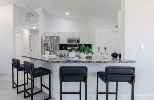 Trafalgar House | Bright & Modern Cape Coral Home · 3BR · Sleeps 8 · BBQ · Beach Gear