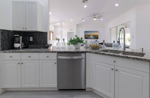 Trafalgar House | Bright & Modern Cape Coral Home · 3BR · Sleeps 8 · BBQ · Beach Gear