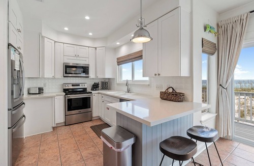 Villa Primera House | Bright & sunny Gulf front home with spacious deck for dolphin watching!
