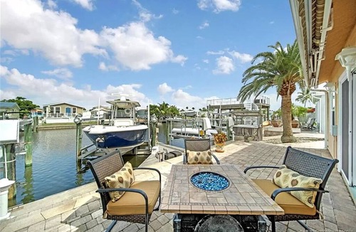 Hutchinson Island South House | Bring your boat and come enjoy island life in this canal front home!