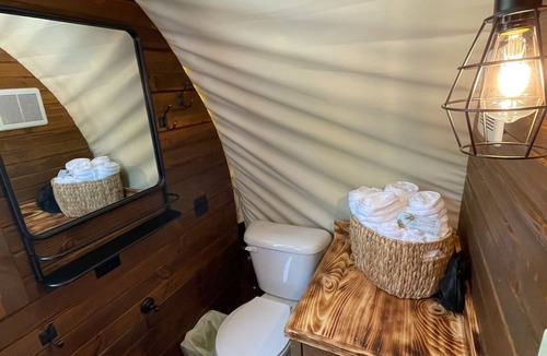 Branson Cottage | California Trail Wagon includes 1 king bed, bathroom w/shower, heat & a/c, smart tv, wi-fi, microwa